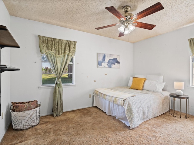6500 Chapel Ln, Lake Worth, TX 76135 - bedroom featuring carpet flooring, a textured ceiling, and ceiling fan