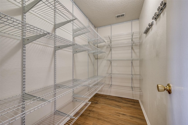 1640 Fieldstone Dr, Little Elm, TX 75068 - walk in closet with wood finished floors