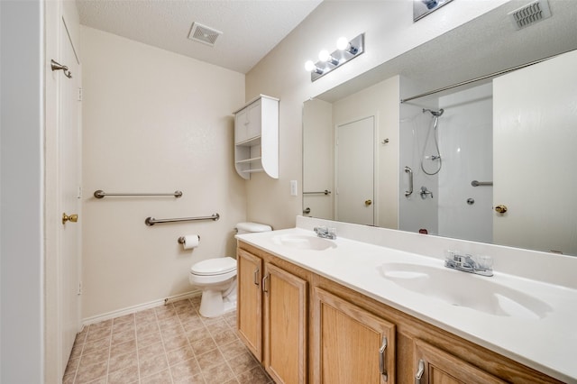 1640 Fieldstone Dr, Little Elm, TX 75068 - bathroom featuring double vanity and a shower