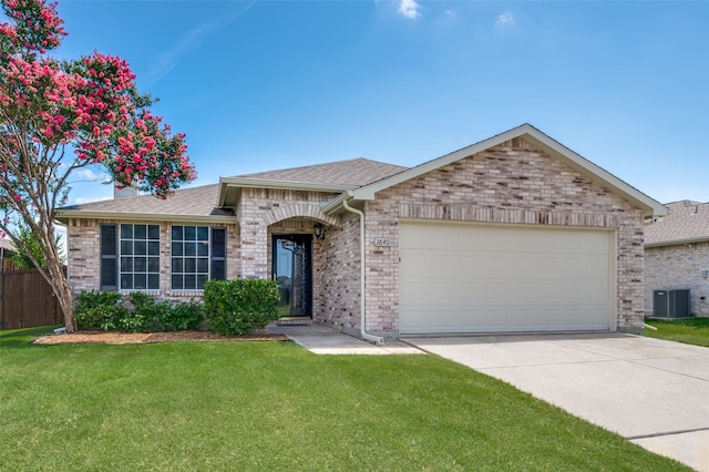 1640 Fieldstone Dr, Little Elm, TX 75068 - ranch-style house with brick siding, a garage, driveway, and roof with shingles