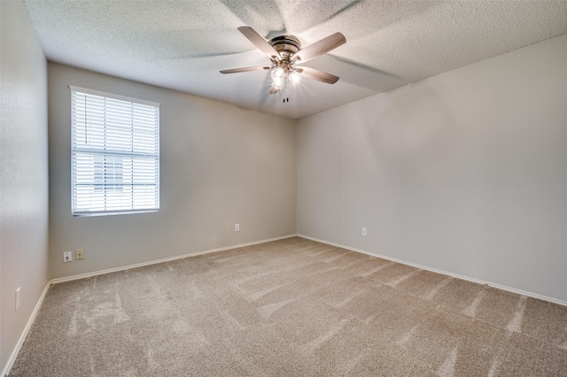 1640 Fieldstone Dr, Little Elm, TX 75068 - spare room featuring carpet flooring, ceiling fan, and a textured ceiling