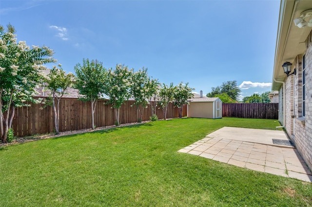 1640 Fieldstone Dr, Little Elm, TX 75068 - fenced backyard with a storage shed and a patio area