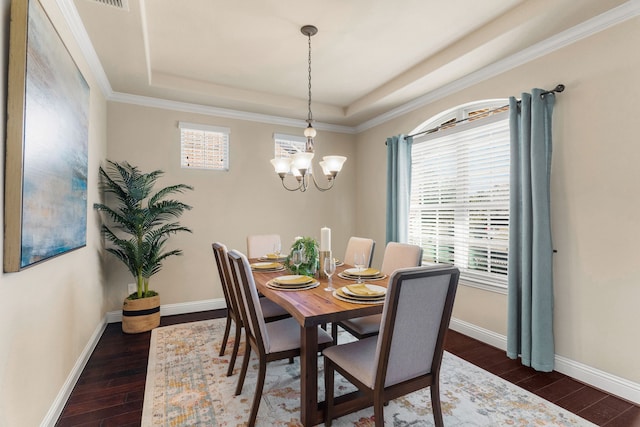 10014 Edgeway Cir, Rowlett, TX 75089 - dining space featuring a raised ceiling, dark wood-style flooring, and a chandelier