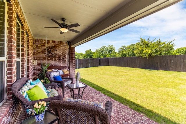 10014 Edgeway Cir, Rowlett, TX 75089 - fenced backyard featuring ceiling fan, outdoor lounge area, and a patio area
