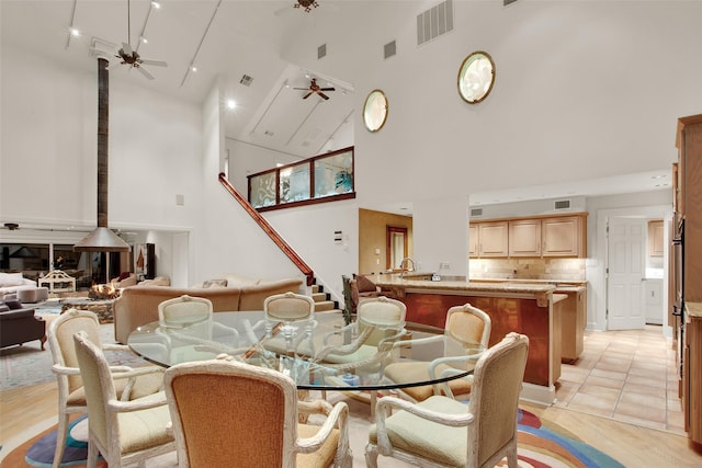 214 Island View Dr, Pottsboro, TX 75076 - dining area featuring a high ceiling and ceiling fan