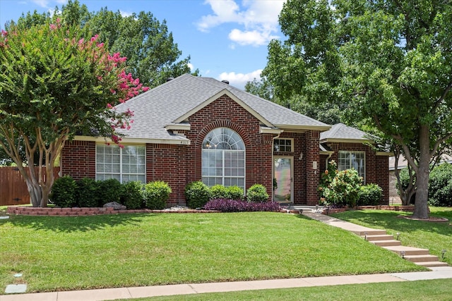 4315 Sarasota Ln, Mckinney, TX 75070 - view of front of home featuring brick siding and a shingled roof