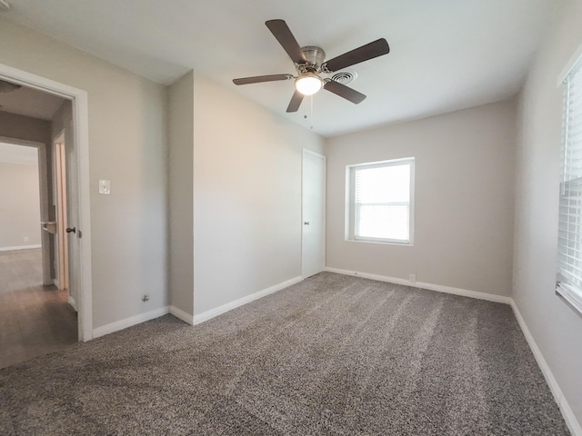 904 Forrestal Dr, Arlington, TX 76010 - unfurnished room featuring carpet and ceiling fan