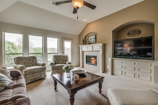 2821 Nighthawk Dr, Mesquite, TX 75181 - living room featuring light carpet, ceiling fan, lofted ceiling, and a fireplace