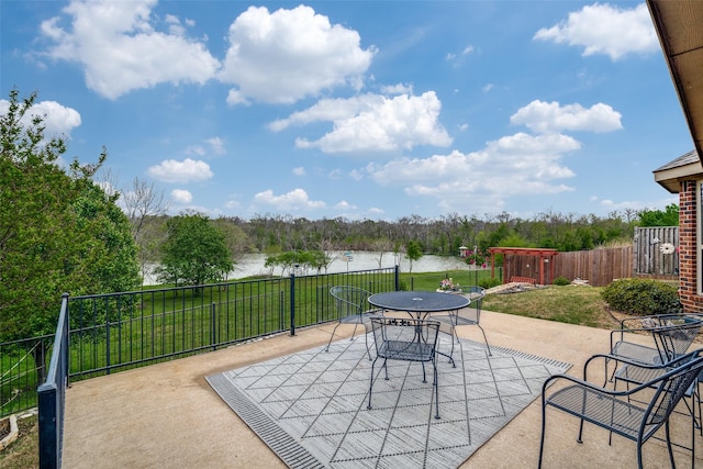 2821 Nighthawk Dr, Mesquite, TX 75181 - view of patio with a water view and outdoor dining area