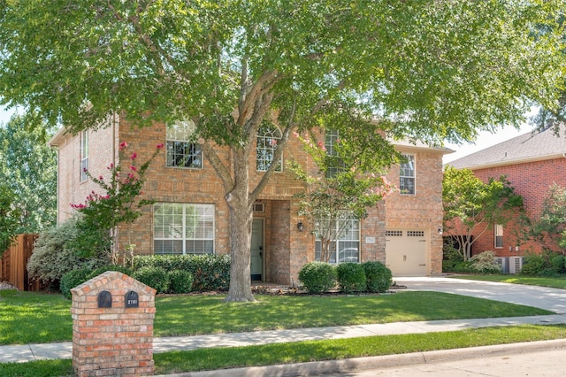 2701 Timberhill Dr, Flower Mound, TX 75028 - view of front of property featuring a garage, driveway, and brick siding
