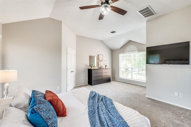 2701 Timberhill Dr, Flower Mound, TX 75028 - bedroom featuring lofted ceiling, carpet, a ceiling fan, and a textured ceiling