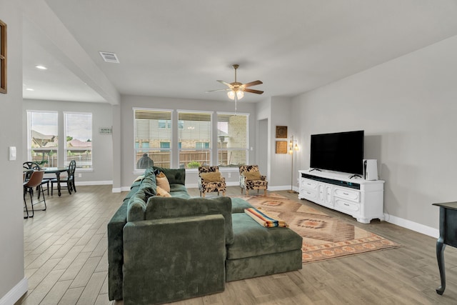 621 Mesquite Grove Rd, Midlothian, TX 76065 - living area with light wood finished floors, a ceiling fan, healthy amount of natural light, and recessed lighting