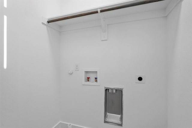 6112 Carlton Garret St, Dallas, TX 75215 - laundry area featuring electric dryer hookup, hookup for a gas dryer, and washer hookup