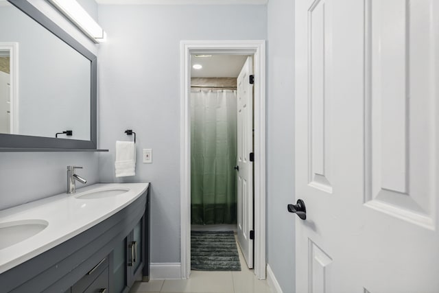 4017 Black Oak Dr, Carrollton, TX 75007 - full bathroom featuring double vanity and tile patterned floors