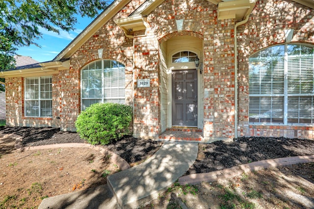 1629 Lakeside Dr, Allen, TX 75002 - property entrance featuring brick siding