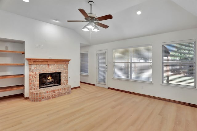 1629 Lakeside Dr, Allen, TX 75002 - unfurnished living room with vaulted ceiling, wood finished floors, a fireplace, a ceiling fan, and recessed lighting