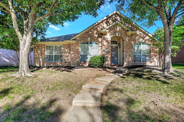 1629 Lakeside Dr, Allen, TX 75002 - traditional home with brick siding and a front yard