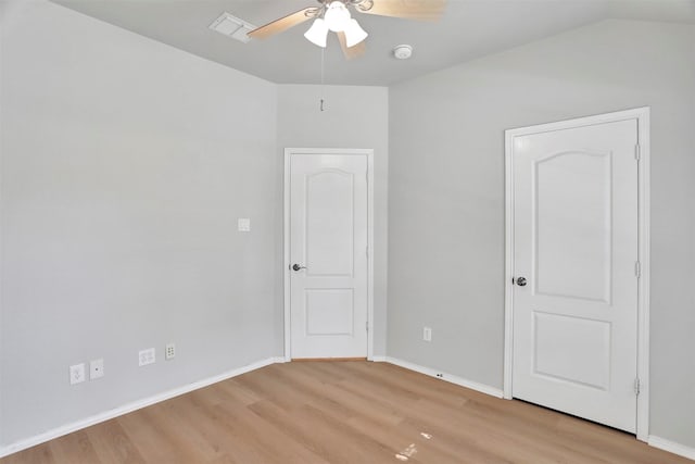 1629 Lakeside Dr, Allen, TX 75002 - unfurnished bedroom with light wood-style flooring and a ceiling fan