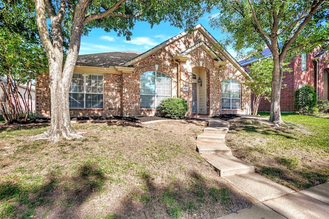 1629 Lakeside Dr, Allen, TX 75002 - traditional home featuring brick siding and a front lawn