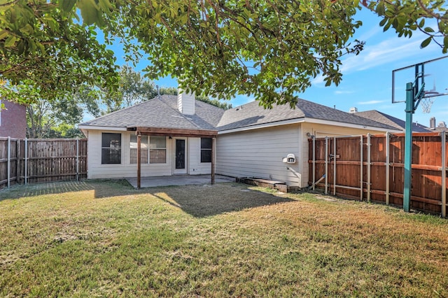 1629 Lakeside Dr, Allen, TX 75002 - back of house featuring a fenced backyard, a chimney, a patio area, and roof with shingles