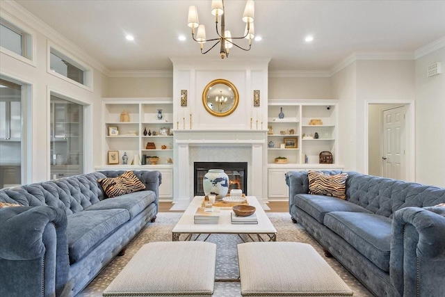 10003 Willow Bend Dr, Woodway, TX 76712 - living room with crown molding, a chandelier, a glass covered fireplace, built in features, and recessed lighting