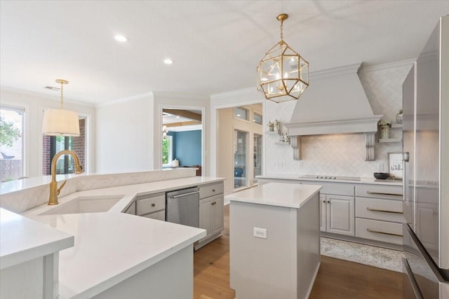 10003 Willow Bend Dr, Woodway, TX 76712 - kitchen featuring a spacious island, dishwasher, ornamental molding, plenty of natural light, and light countertops