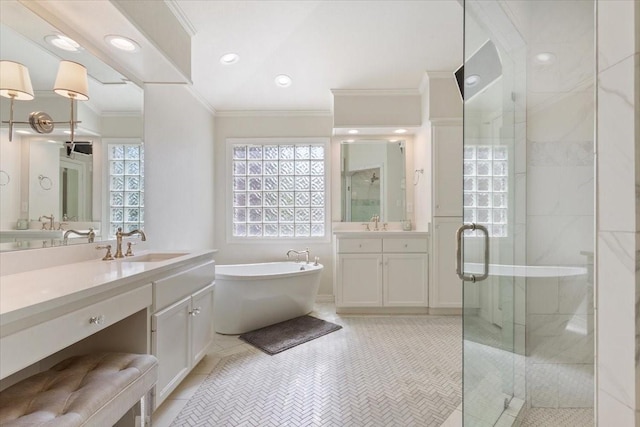 10003 Willow Bend Dr, Woodway, TX 76712 - bathroom with ornamental molding, a shower stall, a soaking tub, two vanities, and tile patterned flooring