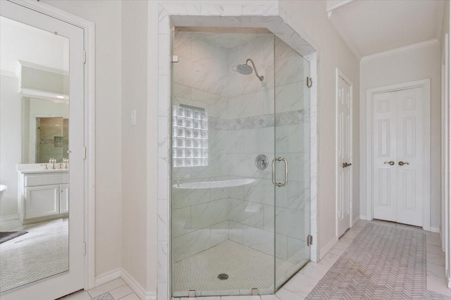 10003 Willow Bend Dr, Woodway, TX 76712 - bathroom with a stall shower, ornamental molding, and vanity
