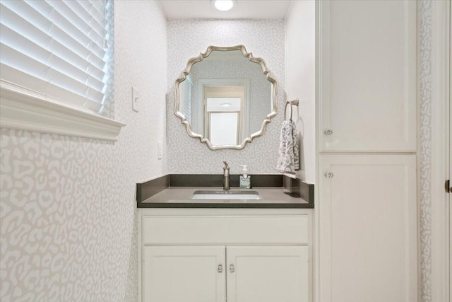 10003 Willow Bend Dr, Woodway, TX 76712 - bathroom with wallpapered walls and vanity