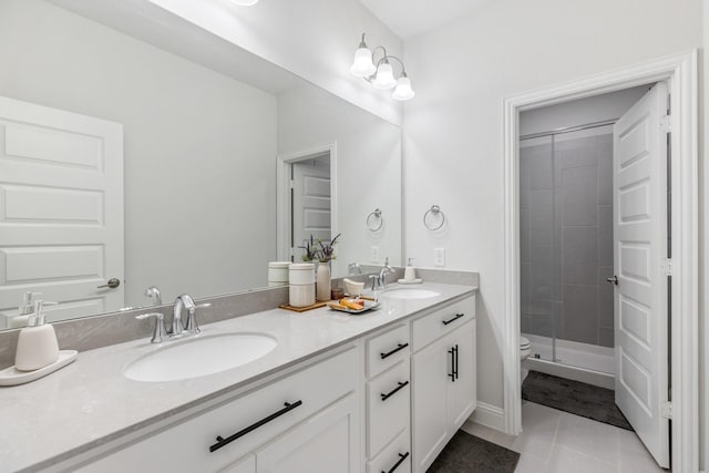 313 Savannah Ln, Oak Point, TX 75068 - bathroom featuring double vanity, tile patterned flooring, and a shower stall