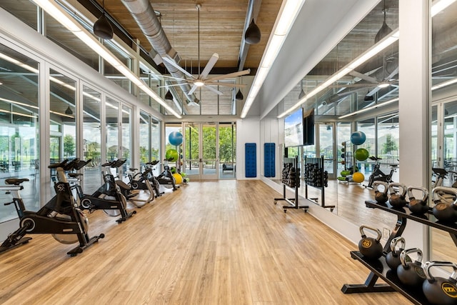 313 Savannah Ln, Oak Point, TX 75068 - gym featuring ceiling fan and wood finished floors
