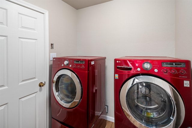 9028 Wild Rose Ln, Cross Roads, TX 76227 - laundry area with washing machine and dryer and wood finished floors