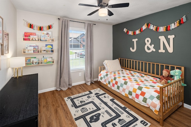 9028 Wild Rose Ln, Cross Roads, TX 76227 - bedroom featuring wood finished floors, multiple windows, and ceiling fan