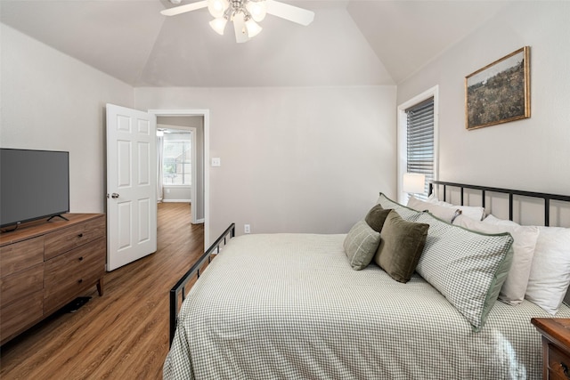 9028 Wild Rose Ln, Cross Roads, TX 76227 - bedroom with vaulted ceiling, wood finished floors, and a ceiling fan