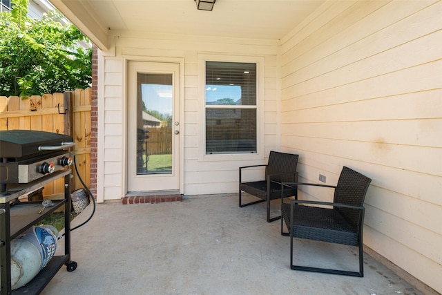 9028 Wild Rose Ln, Cross Roads, TX 76227 - view of exterior entry featuring a patio