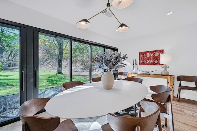 2820 Georgetown Rd, Pottsboro, TX 75076 - dining space with plenty of natural light and light wood-style flooring