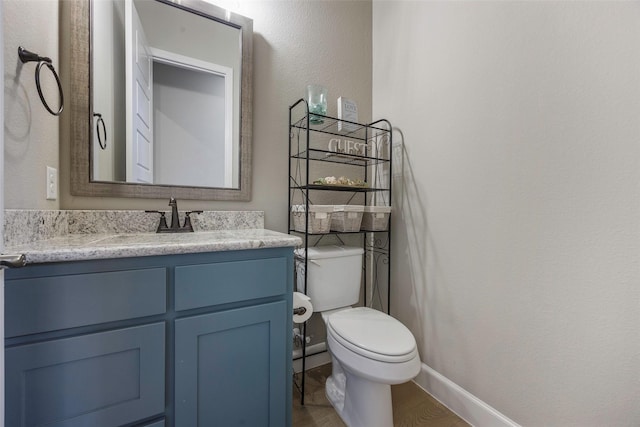 4857 Cumberland Cir, Carrollton, TX 75010 - half bath featuring vanity and wood finished floors