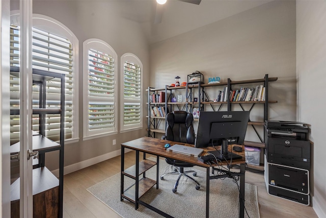 4857 Cumberland Cir, Carrollton, TX 75010 - office with vaulted ceiling, wood finished floors, and a ceiling fan