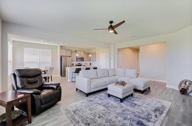 532 Dunmore Dr, Fort Worth, TX 76052 - living area with ceiling fan and light wood-style floors