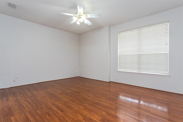 738 Opal Ln, Mesquite, TX 75149 - unfurnished room featuring wood finished floors and ceiling fan