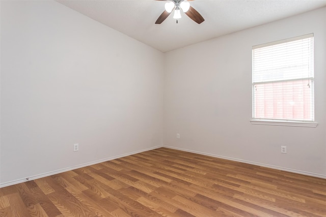 738 Opal Ln, Mesquite, TX 75149 - empty room featuring light wood-style floors and a ceiling fan