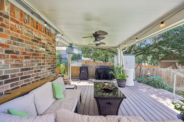 504 Lake Point Dr, Little Elm, TX 75068 - wooden terrace with a grill, a fenced backyard, a ceiling fan, and an outdoor hangout area
