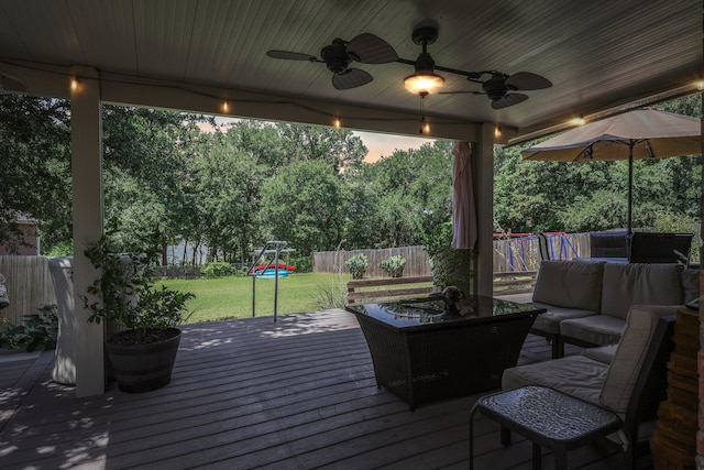 504 Lake Point Dr, Little Elm, TX 75068 - wooden terrace featuring an outdoor hangout area, a fenced backyard, a ceiling fan, and a playground