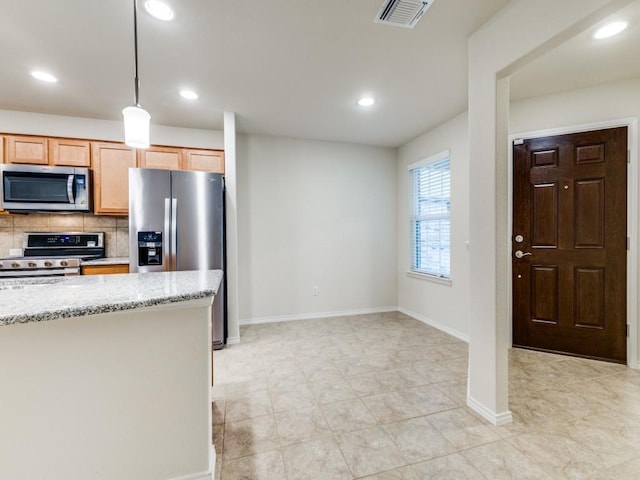 1244 Eagle Ln, Little Elm, TX 76227 - kitchen featuring stainless steel appliances, recessed lighting, light stone countertops, tasteful backsplash, and pendant lighting