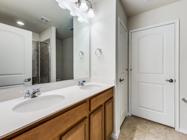 1244 Eagle Ln, Little Elm, TX 76227 - full bathroom featuring double vanity, tiled shower, and tile patterned flooring