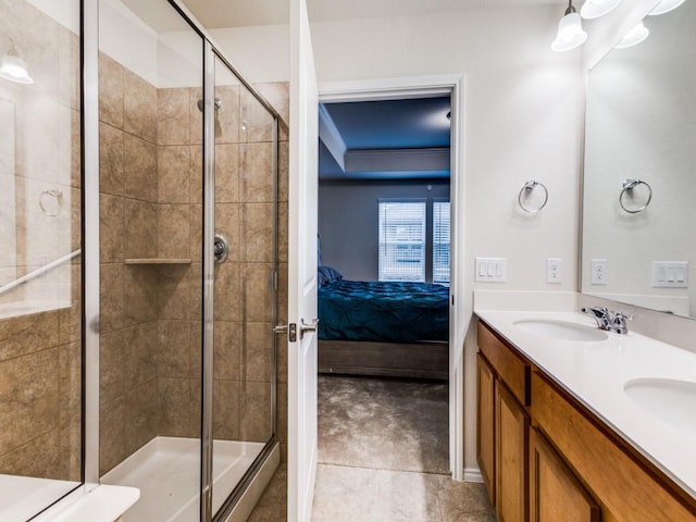 1244 Eagle Ln, Little Elm, TX 76227 - ensuite bathroom with a shower stall, double vanity, and tile patterned floors