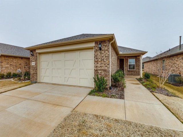 1244 Eagle Ln, Little Elm, TX 76227 - view of front of house with brick siding, driveway, and an attached garage