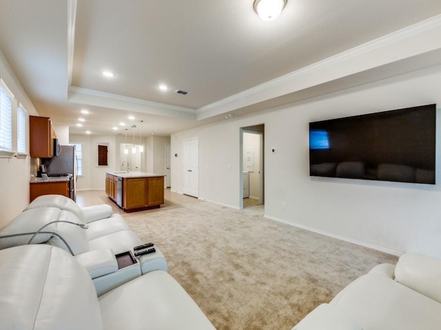 1244 Eagle Ln, Little Elm, TX 76227 - living room featuring ornamental molding, a raised ceiling, light carpet, and recessed lighting