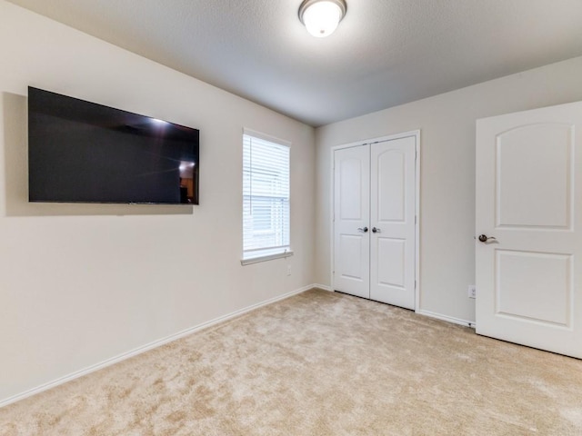 1244 Eagle Ln, Little Elm, TX 76227 - unfurnished bedroom featuring carpet flooring and a closet