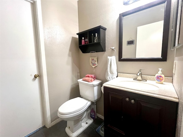 309 Bellaire Dr, Denton, TX 76209 - half bath with vanity and tile patterned flooring
